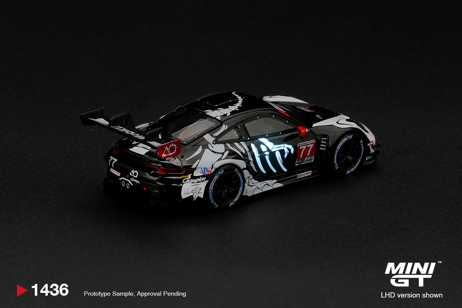 Porsche 911 GT3 R (992) #77 AO Racing "Skeleton Rexy" 2026 IMSA Petit Le Mans Box